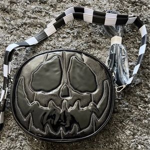 Sold out, New and unused love pain and stitches black glitter bag.